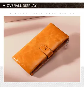 Lange Damen-Geldbörse aus Vintage-Leder in Orange mit Reißverschluss und Druckknopf
