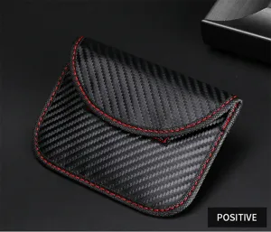 Detailed view showing the carbon fiber texture and red stitching of the RFID key pouch