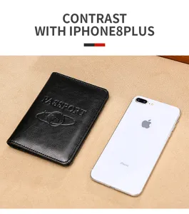 Premium black RFID leather passport holder compared with a smartphone for size reference