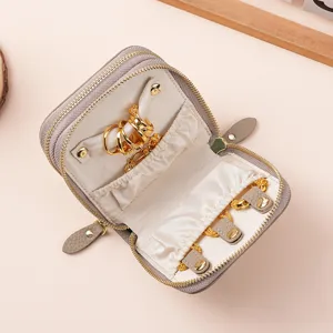 Portable double-layer leather jewelry travel organizer for gold rings and necklaces