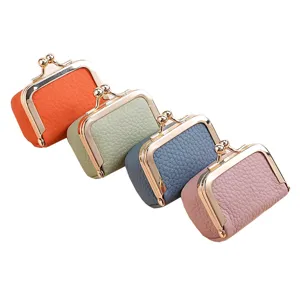 Four colorful genuine leather mini coin purses with vintage gold kiss-lock clasp