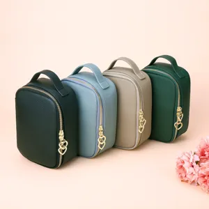 Premium lychee pattern cowhide leather makeup bags with gold heart zippers in four colors