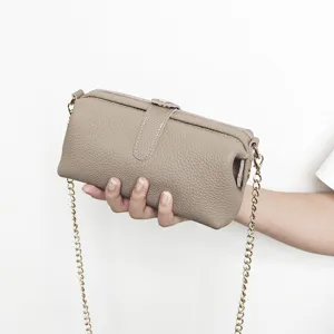 Minimalist genuine cowhide leather shoulder bag with detachable gold chain strap in taupe