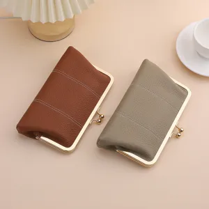 Two vintage kiss-lock genuine leather long wallets in brown and grey pebbled leather