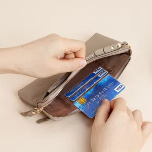 Γυναικείο μακρύ πορτοφόλι από γνήσιο δέρμα με τρία φερμουάρ και μεγάλη χωρητικότητα