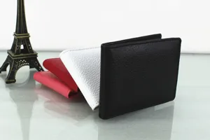 Detail view of multi-color leather driving license covers with pebble grain texture