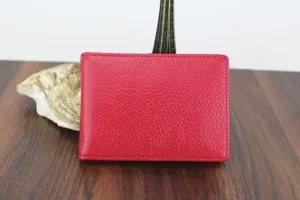 Red pebbled genuine leather driver's license holder featuring fine stitching details