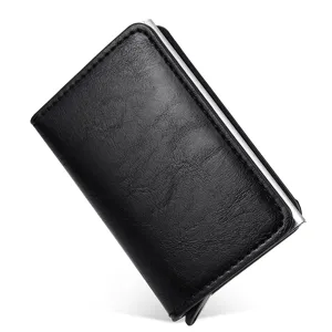 Black RFID blocking pop-up card holder with premium leather texture and aluminum case