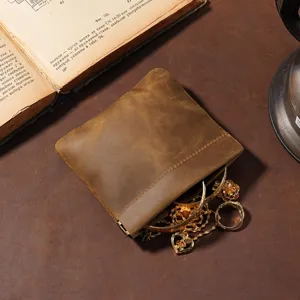 Vintage crazy horse leather mini pouch with spring closure for jewelry storage