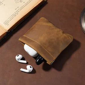 Vintage crazy horse leather mini pouch with spring closure for earbuds and coins