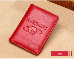 Detail of a red genuine leather RFID passport holder with embossed globe logo