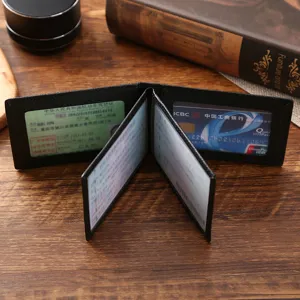 Black leather driver's license and vehicle registration holder with 4 card slots