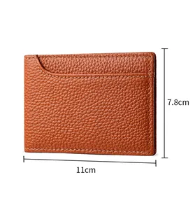 Close-up of a brown lychee grain leather card holder showing dimensions 11cm by 7.8cm