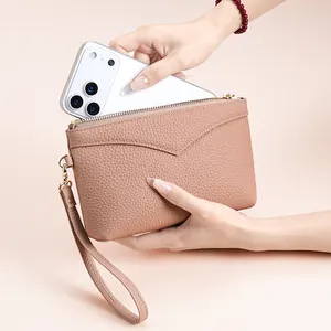 Damen-Handy-Clutch aus echtem Leder mit Litschimuster und Handschlaufe in Rosérosa