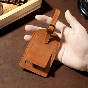 Handcrafted Crazy Horse leather luggage tag featuring a vertical flap and buckle