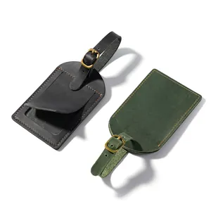 Crazy horse leather luggage tag with hidden card slot and adjustable buckle strap.