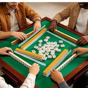 Close-up of four people using clear acrylic pushers during a mahjong tabletop game