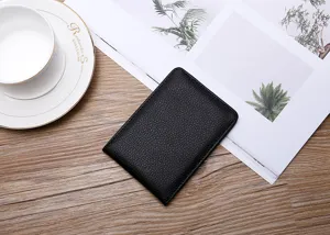 Ultra-thin black pebble leather driving license cover in a minimalist business setting