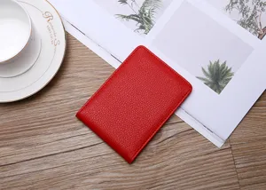 Close-up detail of a red minimalist textured driving license card holder sleeve