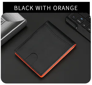 Detalle macro de una cartera delgada de cuero negro con un forro interior naranja vibrante