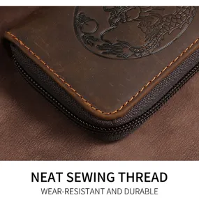 Close-up detail of neat stitching on a high-quality brown leather card wallet with dragon design