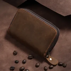 Premium vintage brown leather card holder with zipper and decorative coffee beans backdrop