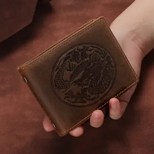 Vintage crazy horse leather card holder featuring an embossed dragon totem design