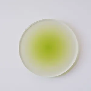 Detail showing the frosted texture and green gradient of this acrylic drink coaster