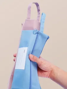 Detailed view of waterproof Morandi Oxford B4 file bag with index label and zipper