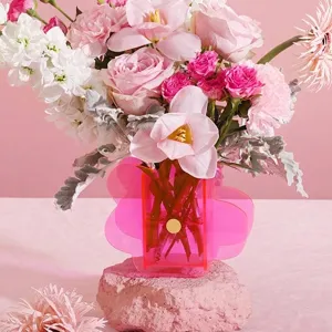 Contemporary pink transparent acrylic flower vase with unique petal shape for home decoration