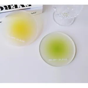 Frosted gradient acrylic coaster detail showing yellow and green heat resistant mats