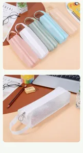 Close-up of a white mesh pencil case showing the fine texture and metal zipper detail
