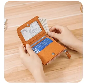 Internal view of a brown leather RFID wallet with ID window and card slots