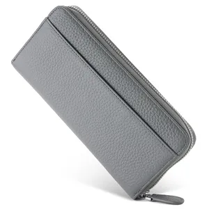 Grey leather long wallet detail, zipper closure and card slot design, daily minimalist style.