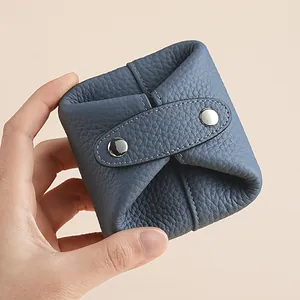 Premium blue genuine leather mini coin purse and earbud storage bag with snap buttons
