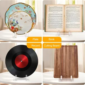 Acrylic display stand holding a plate, book, vinyl record, and cutting board