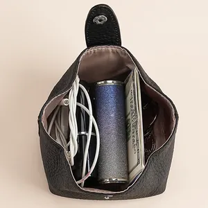 Compact black genuine leather coin purse and mini storage bag for earphones and lipstick