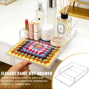 Detail of the wavy acrylic tray featuring a functional slide-out drawer for storage