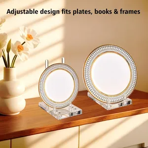Clear acrylic adjustable display stand holding decorative plates on a wooden shelf