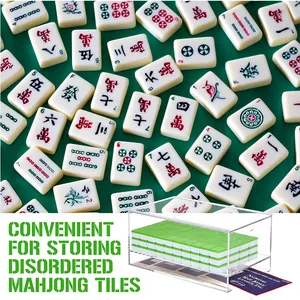 Clear acrylic Mahjong storage box with sliding lid displaying organized green tiles