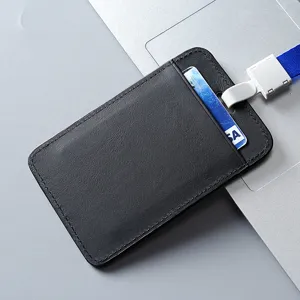 Elegant black genuine leather ID badge holder with blue lanyard displayed on a laptop