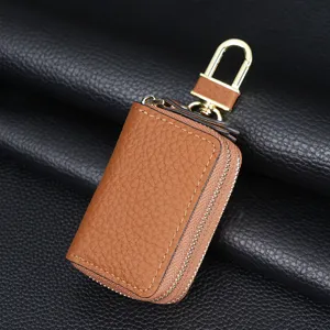Funda de cuero genuino marrón para llaves de coche con doble cremallera y gancho