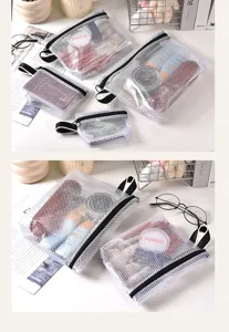 Detailansicht der weißen Mesh-Aufbewahrungstaschen für Toilettenartikel und Make-up