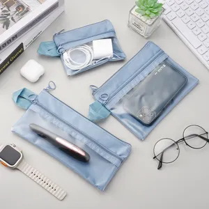 Trois sacs de rangement en filet bleu pour câbles de voyage et toilette