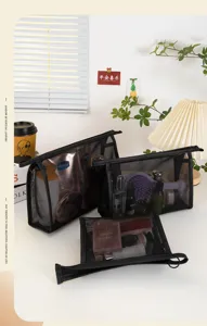 Detailed lifestyle view of black mesh makeup bags in various sizes for storage