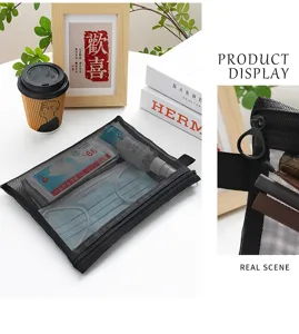 Detail view of black mesh storage bag with zipper and transparent organizer interior