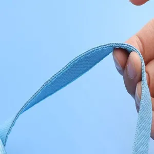 Κοντινή λεπτομέρεια ενισχυμένης γαλάζιας λαβής καμβά αδιάβροχης τσάντας εγγράφων