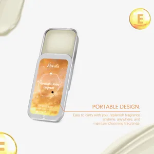 Detail of portable solid fragrance balm in a sliding tin with romantic retro packaging.