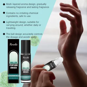 Application of Roxelis unisex roller perfume on wrist with 10ml bottle and box