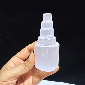 Natural white selenite tower crystal for meditation and home decor ornament.
